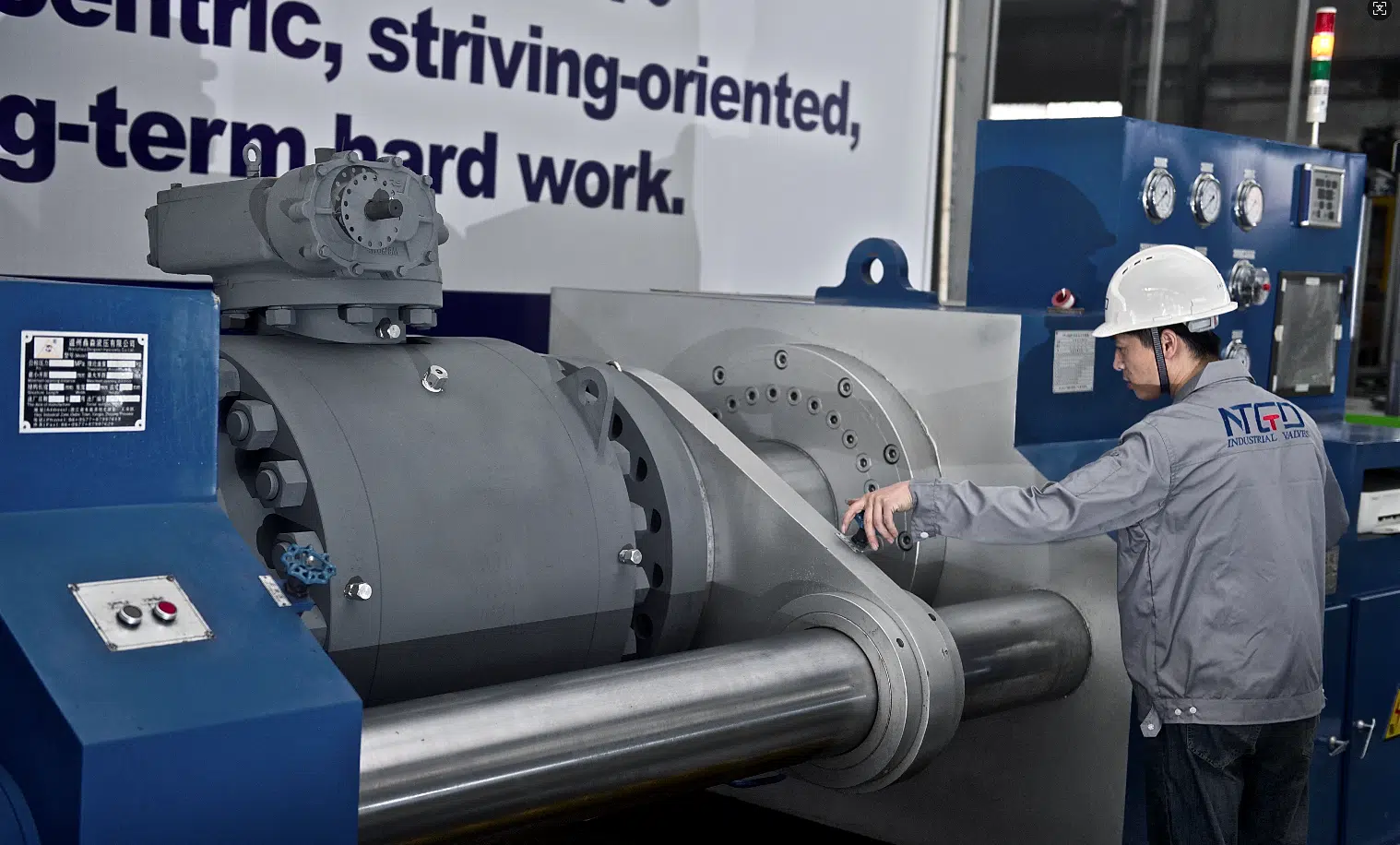 Industrial valve pressure testing equipment showing quality verification and API testing process in valve manufacturing