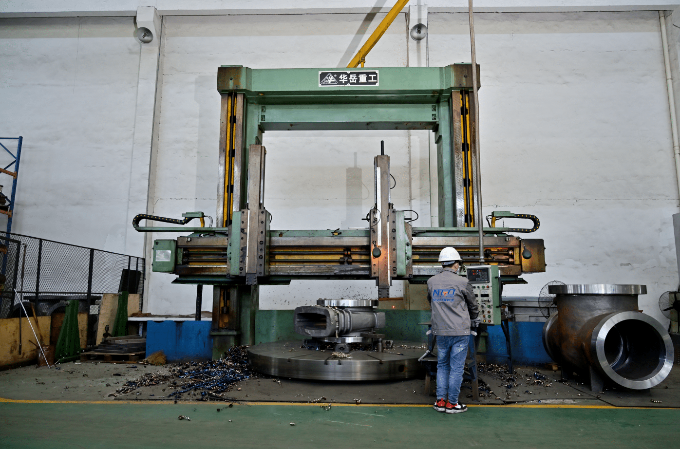 Industrial valve CNC machining workshop showing large valve body processing and manufacturing environment