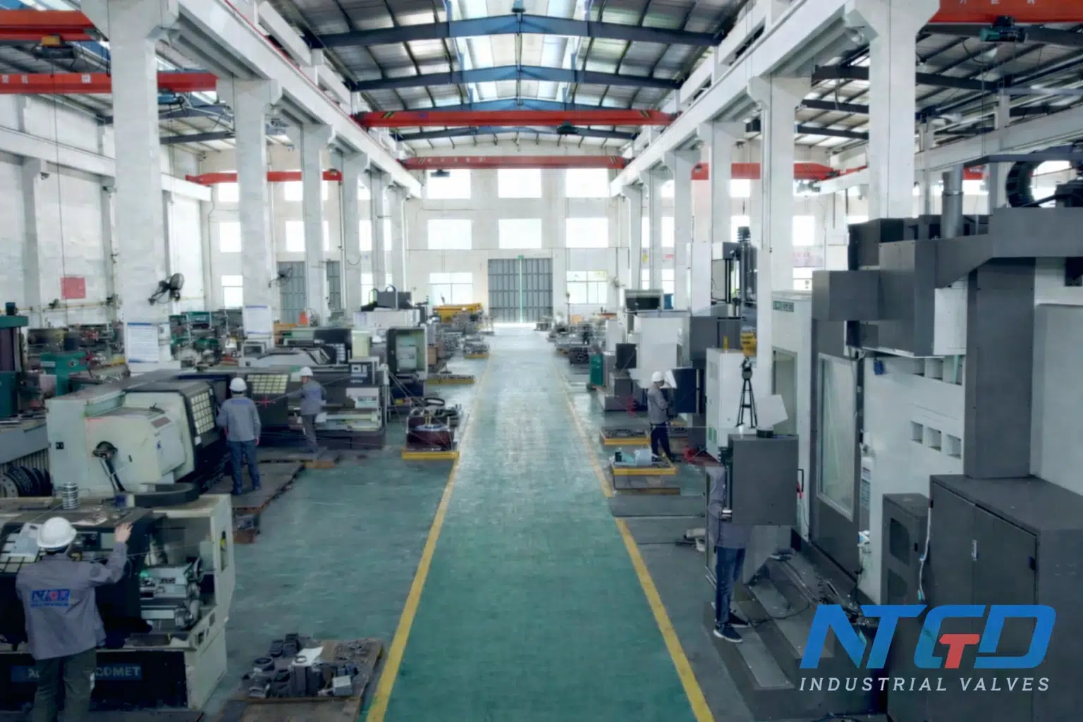 Industrial valve manufacturing workshop with CNC machining and production environment for ball valve components