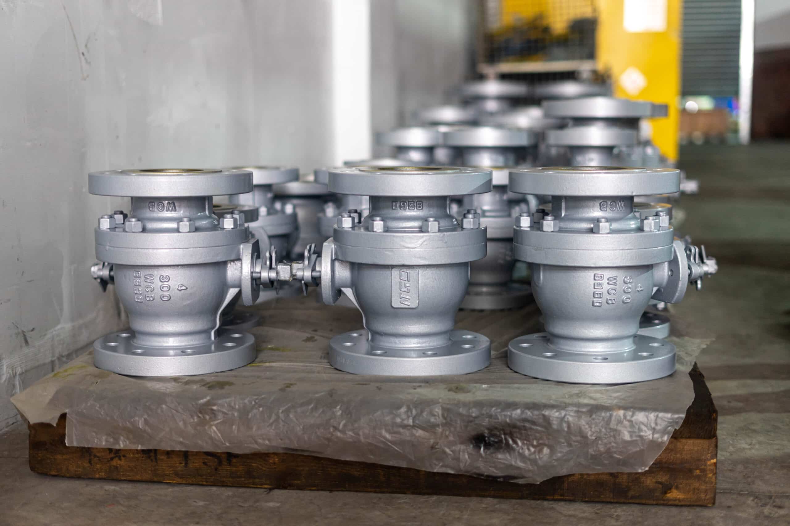 Compact flanged floating ball valves in a workshop batch