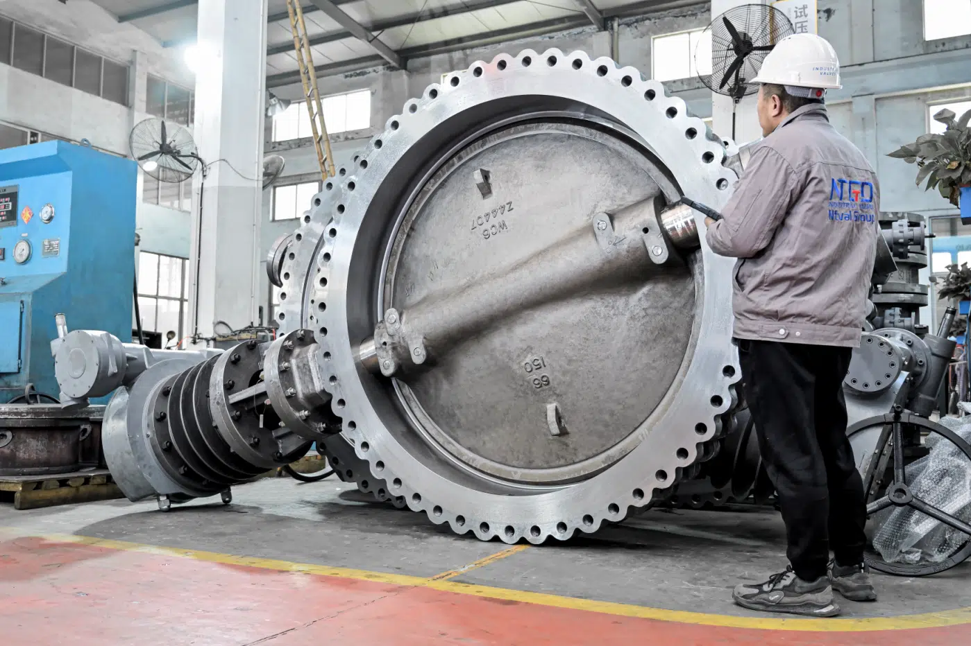 Large flanged butterfly valve disc and body inspection in NTGD workshop