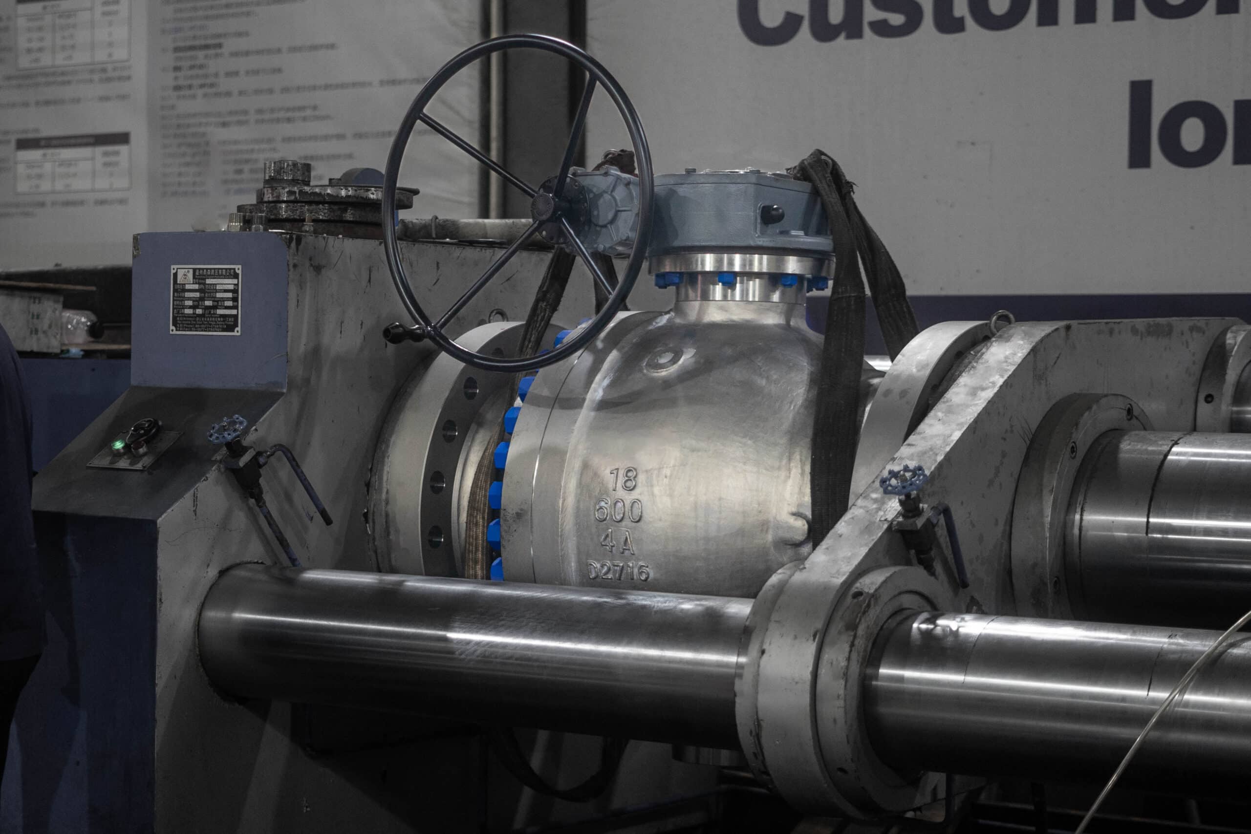 Split-body ball valve mounted for factory inspection and pressure testing