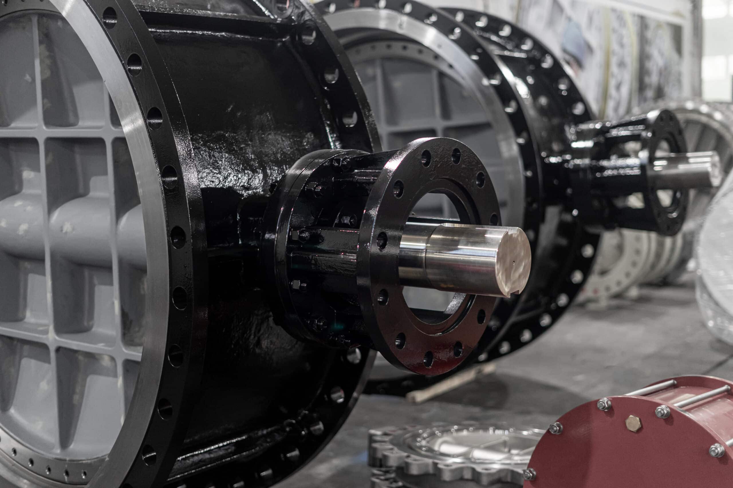 Large flanged butterfly valve shaft and body in workshop