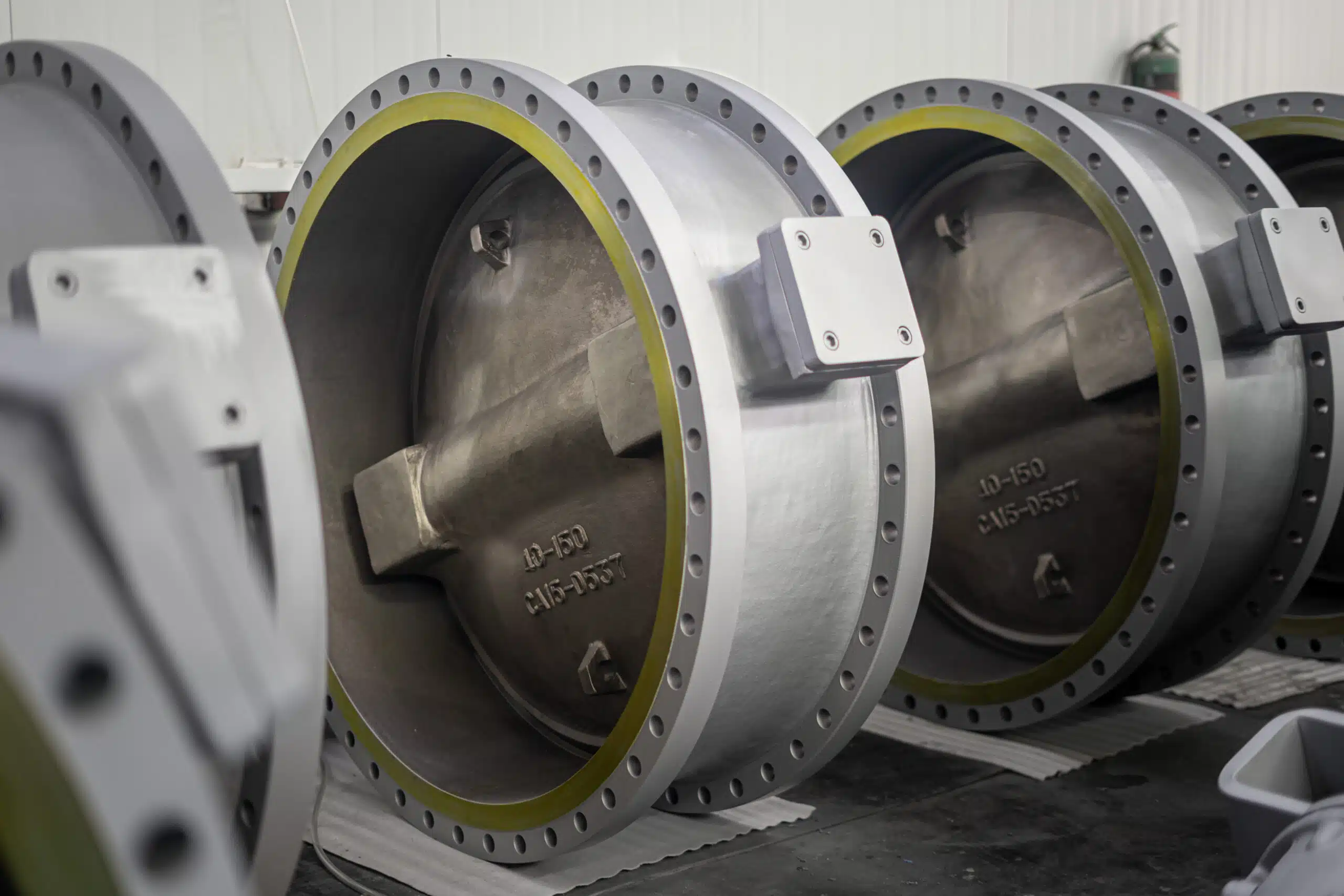 40 inch 150LB WCB flanged gear operated metal seated triple offset butterfly valve bodies in workshop.